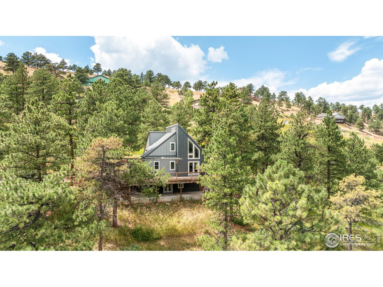 6521 Olde Stage Road Boulder, CO 80302 - Photo 43 of 47 a bathroom with a sink and a mirror