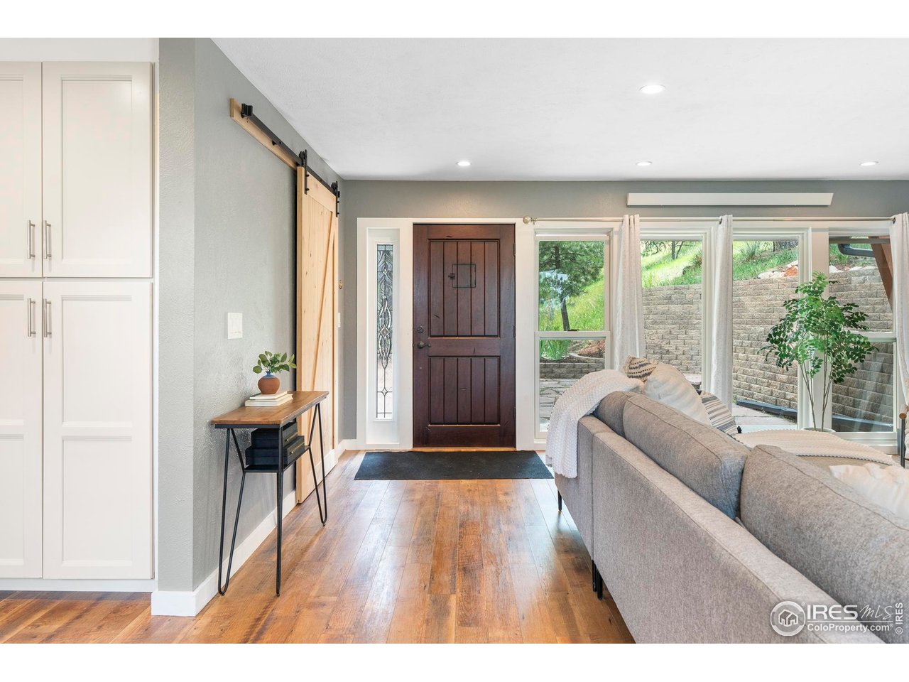 6521 Olde Stage Road Boulder, CO 80302 - Photo 5 of 47 a living room with furniture and a large window