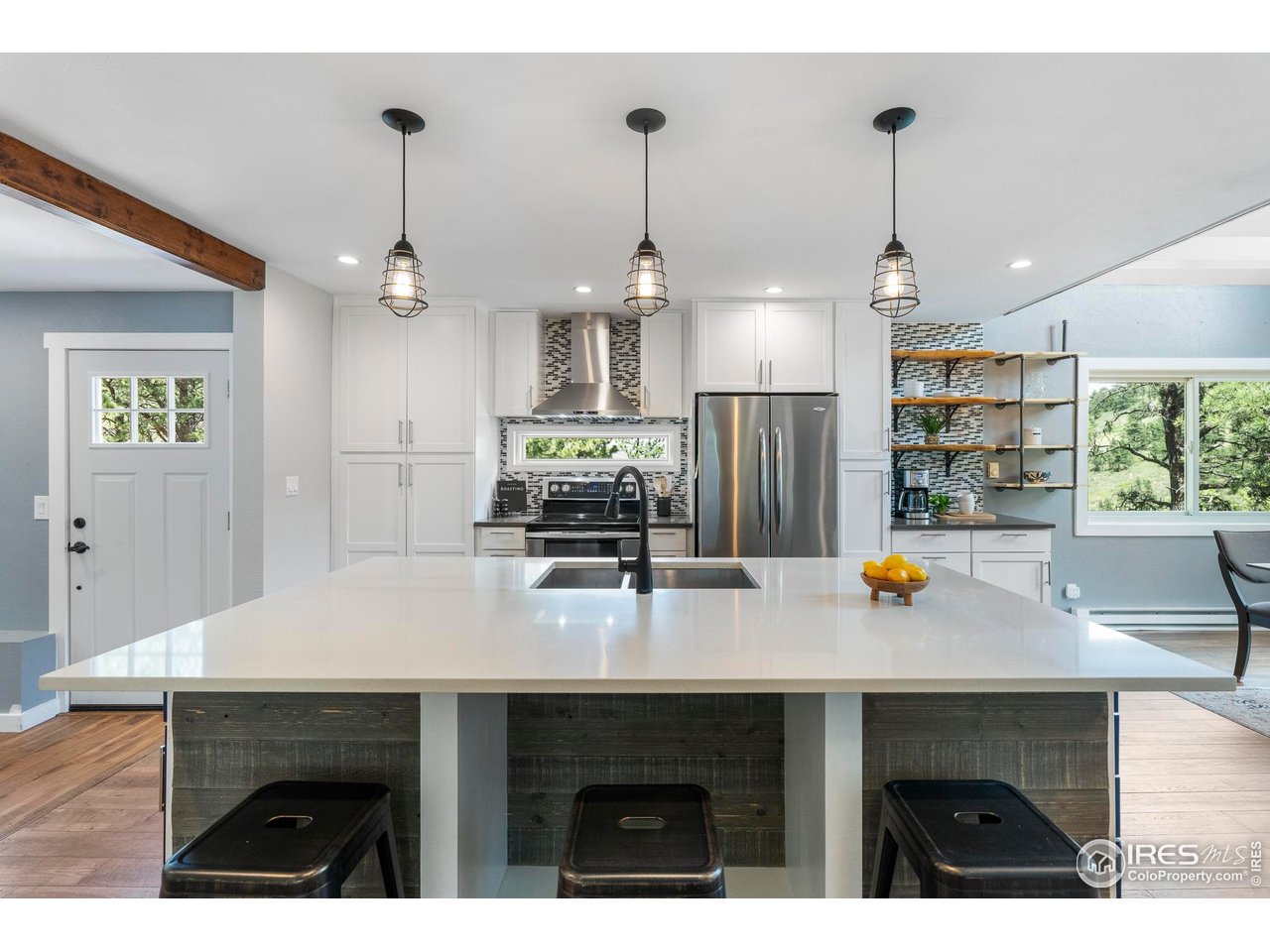 6521 Olde Stage Road Boulder, CO 80302 - Photo 9 of 47 a kitchen with a counter space cabinets and wooden floor