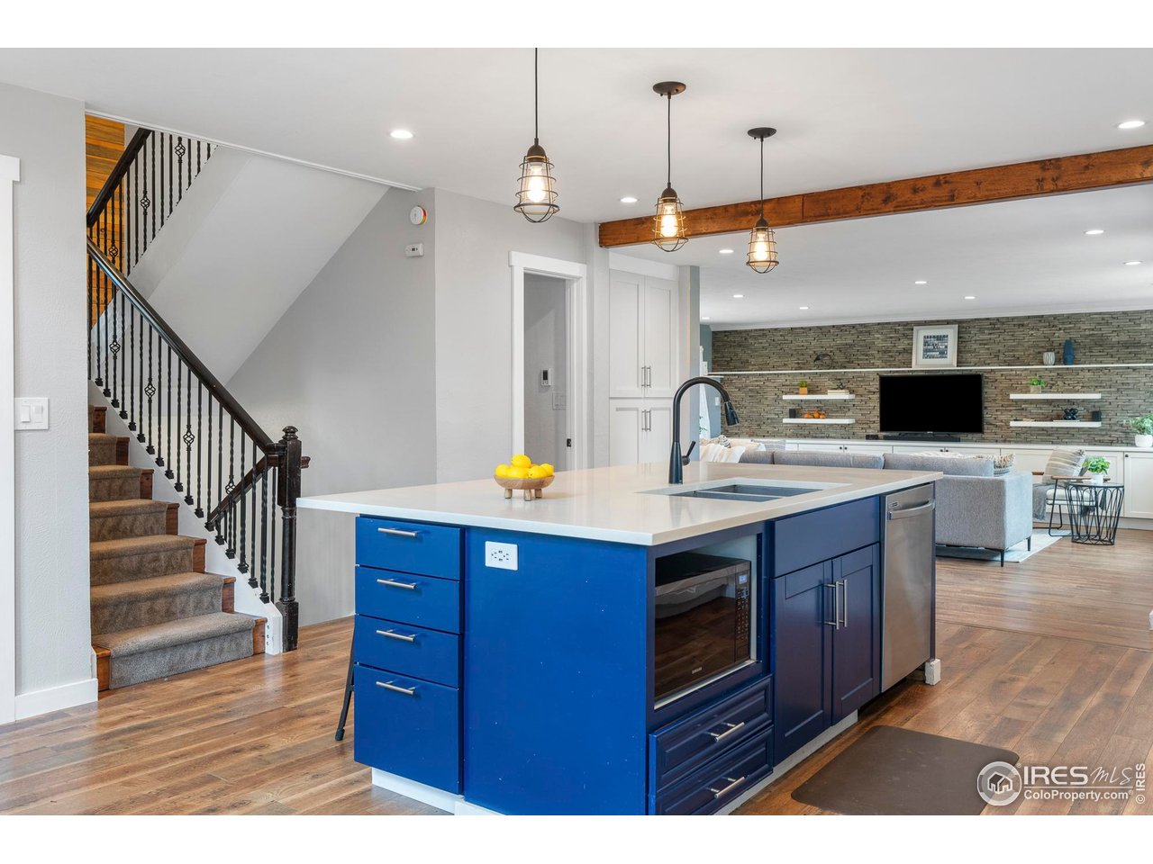 6521 Olde Stage Road Boulder, CO 80302 - Photo 10 of 47 a kitchen with a sink and wooden cabinets
