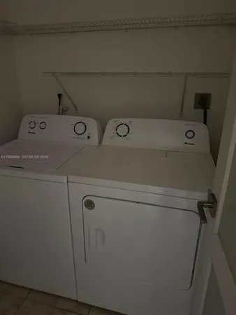 a view of empty room with windows