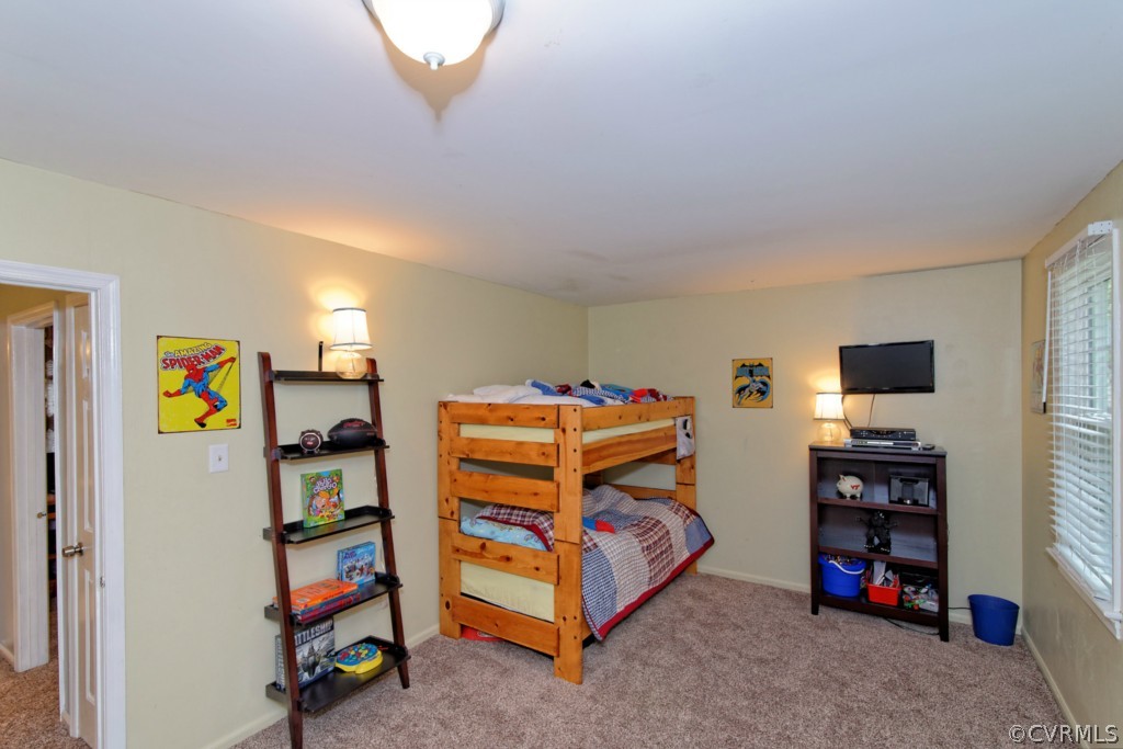 4908 Court Ridge Terrace Midlothian, VA 23112 - Photo 14 of 24 a bedroom with furniture and a flat screen tv
