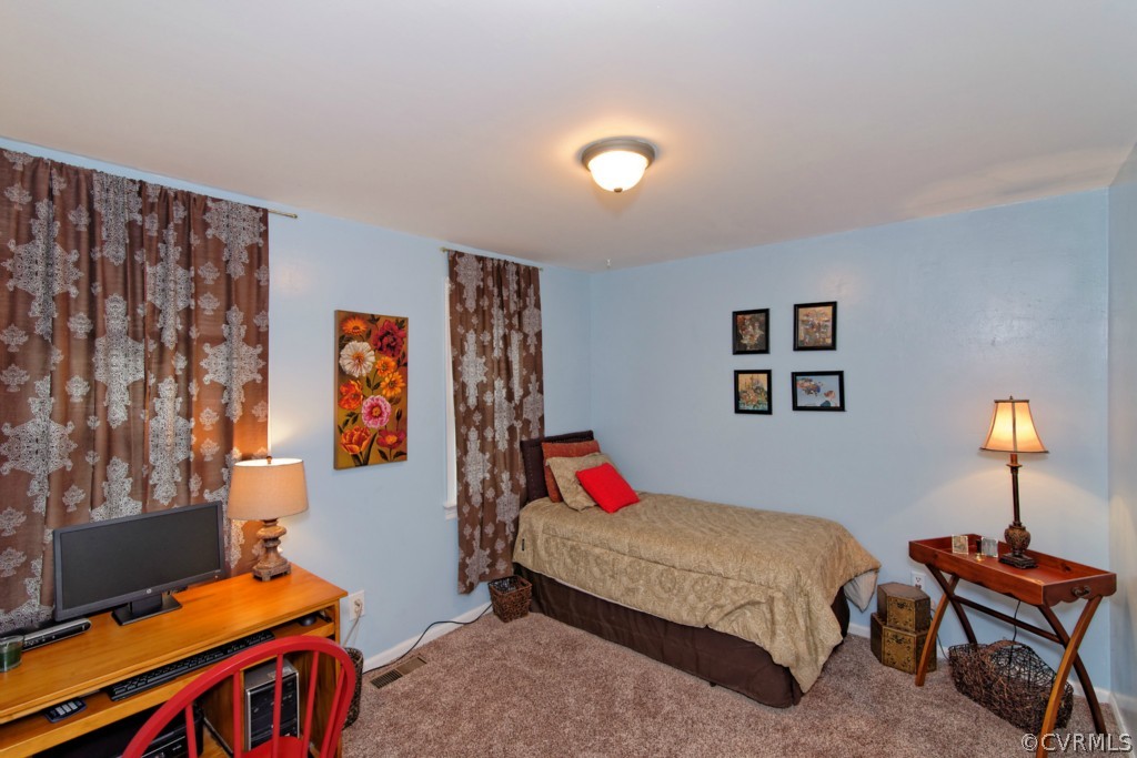 4908 Court Ridge Terrace Midlothian, VA 23112 - Photo 16 of 24 a bedroom with a bed and a window
