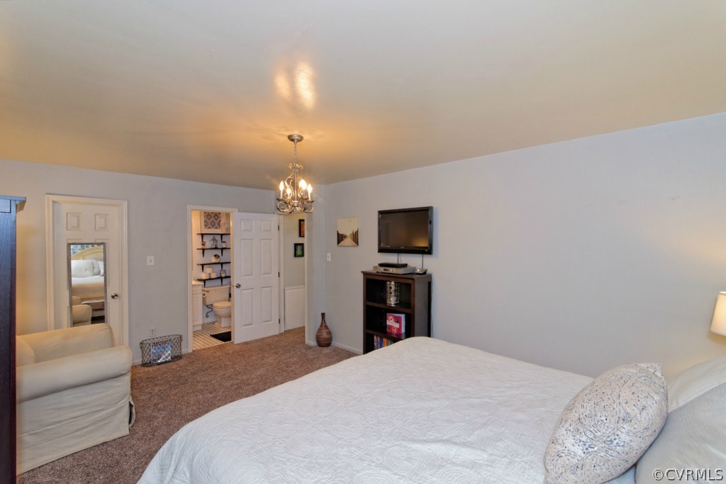 4908 Court Ridge Terrace Midlothian, VA 23112 - Photo 20 of 24 a bedroom with a bed and a flat screen tv