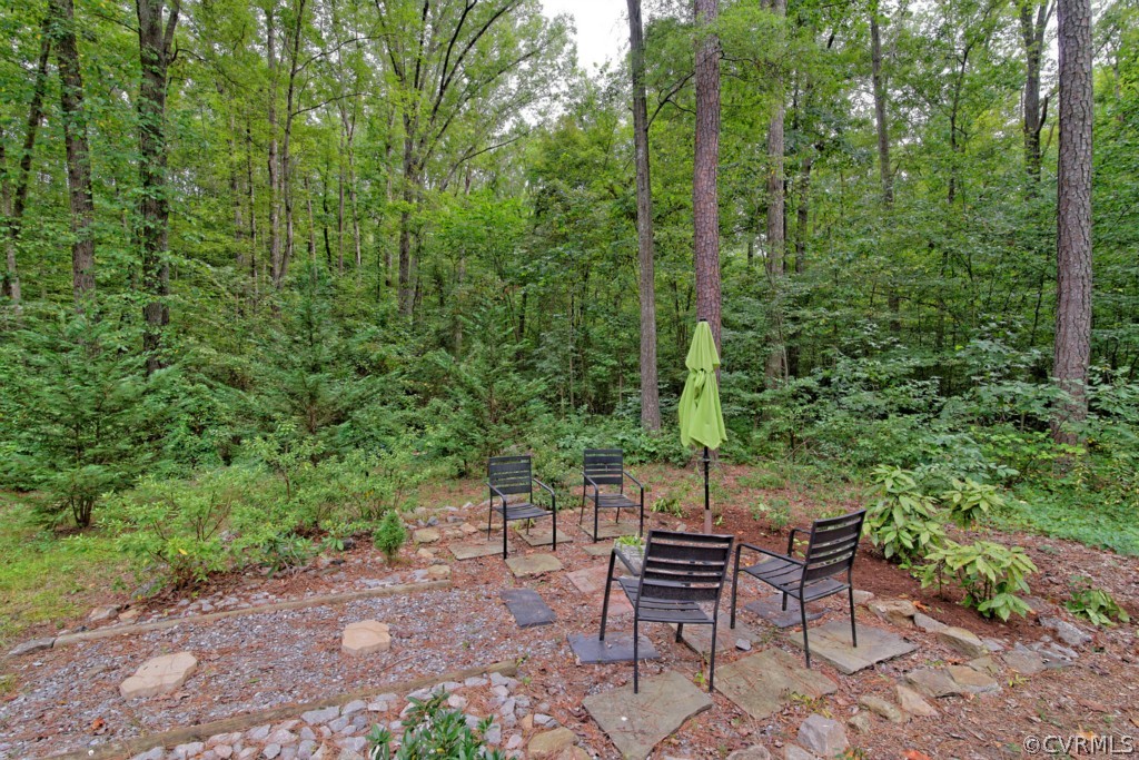 4908 Court Ridge Terrace Midlothian, VA 23112 - Photo 24 of 24 a view of a chairs and table in the backyard