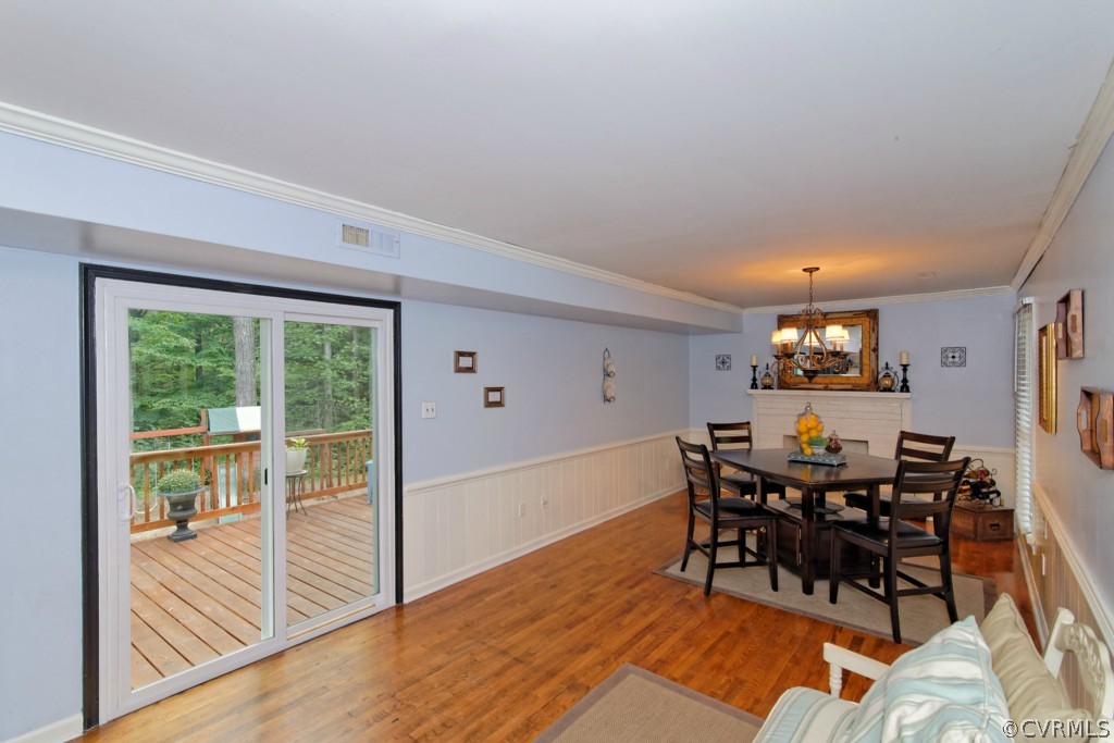 4908 Court Ridge Terrace Midlothian, VA 23112 - Photo 8 of 24 a view of a dining room with furniture and chandelier