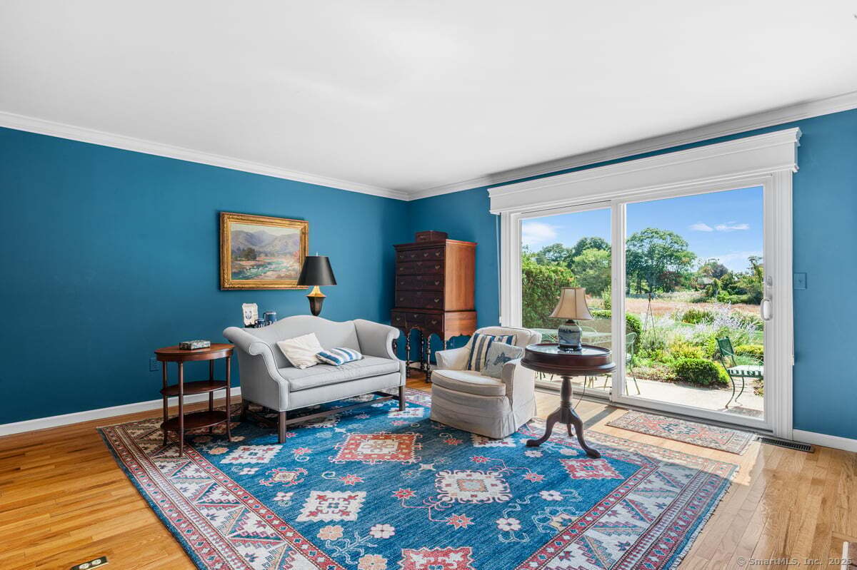 100 Dudley Avenue, Unit H43 Old Saybrook, CT 06475 - Photo 12 of 35 a living room with furniture and a rug