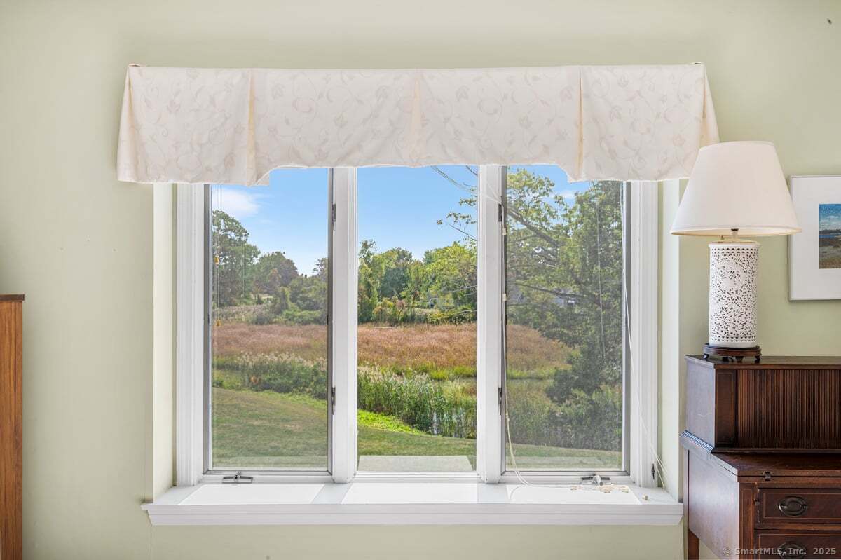 100 Dudley Avenue, Unit H43 Old Saybrook, CT 06475 - Photo 16 of 35 a view of a bathroom with a tub and a large window