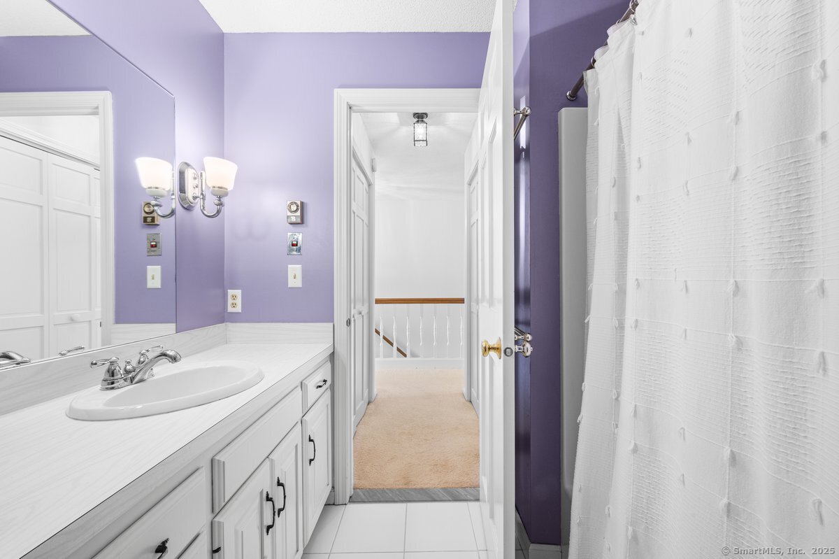 100 Dudley Avenue, Unit H43 Old Saybrook, CT 06475 - Photo 21 of 35 a bathroom with a sink vanity tub and shower
