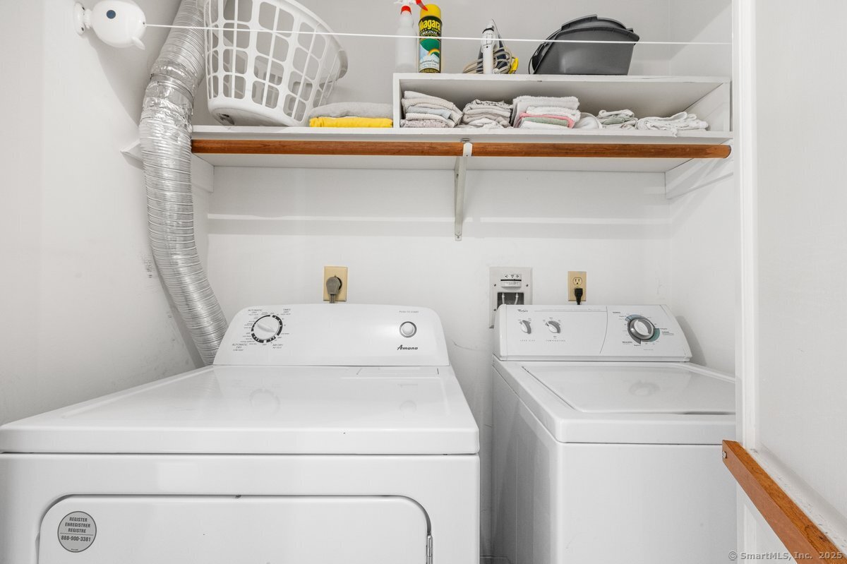 100 Dudley Avenue, Unit H43 Old Saybrook, CT 06475 - Photo 23 of 35 a utility room with dryer and washer