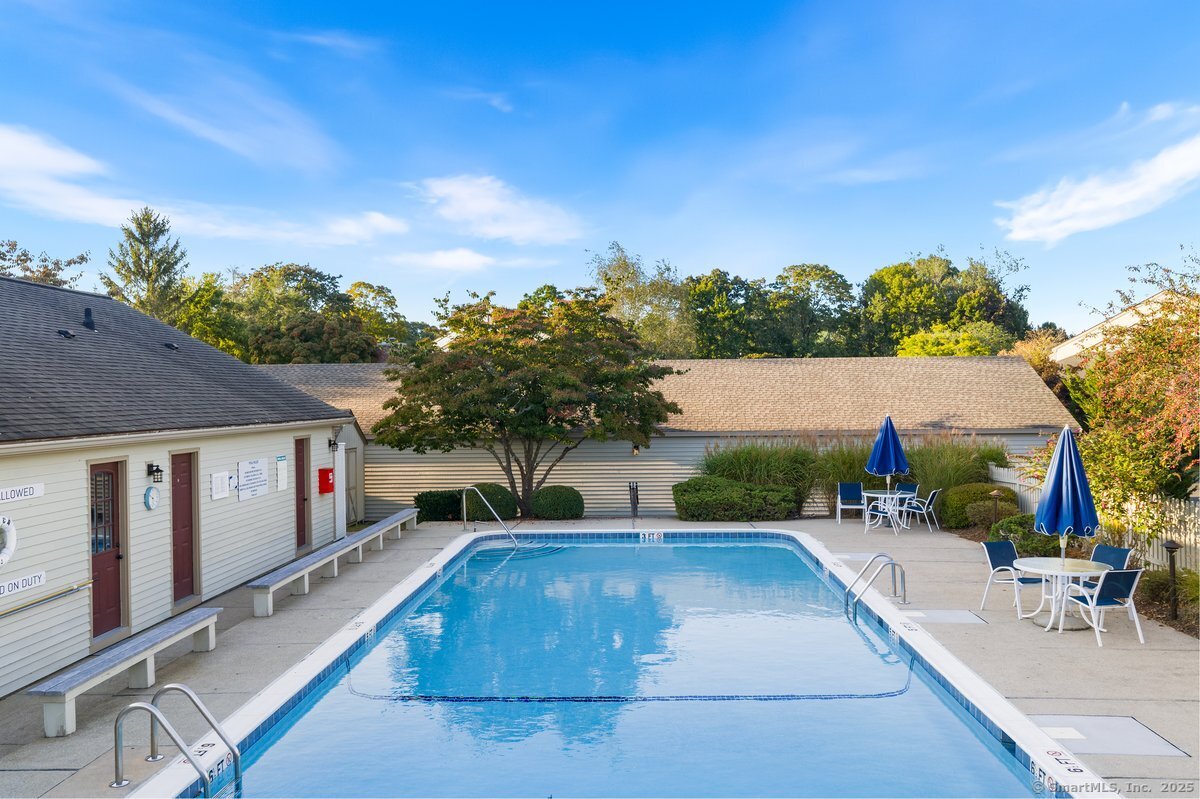 100 Dudley Avenue, Unit H43 Old Saybrook, CT 06475 - Photo 30 of 35 a view of house with swimming pool and sitting area