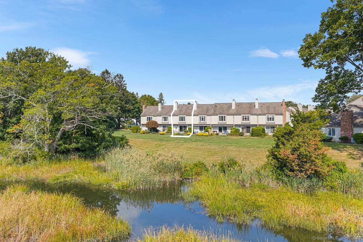 100 Dudley Avenue, Unit H43 Old Saybrook, CT 06475 - Photo 34 of 35 a view of a lake with houses