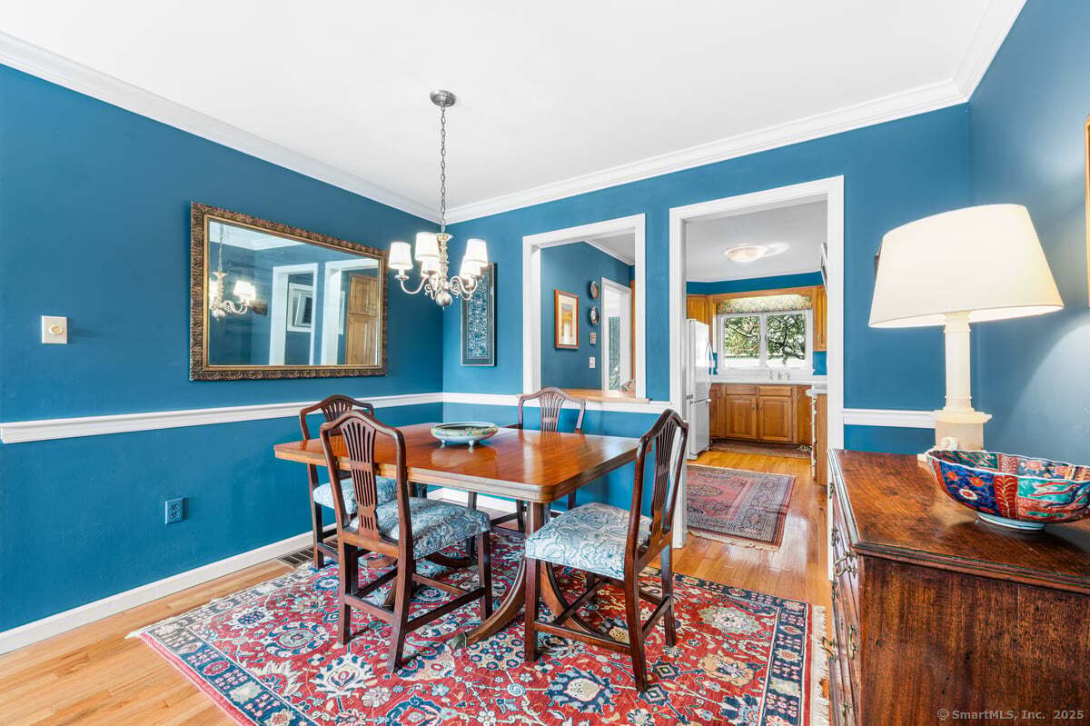 100 Dudley Avenue, Unit H43 Old Saybrook, CT 06475 - Photo 8 of 35 a dining room with a table and chairs