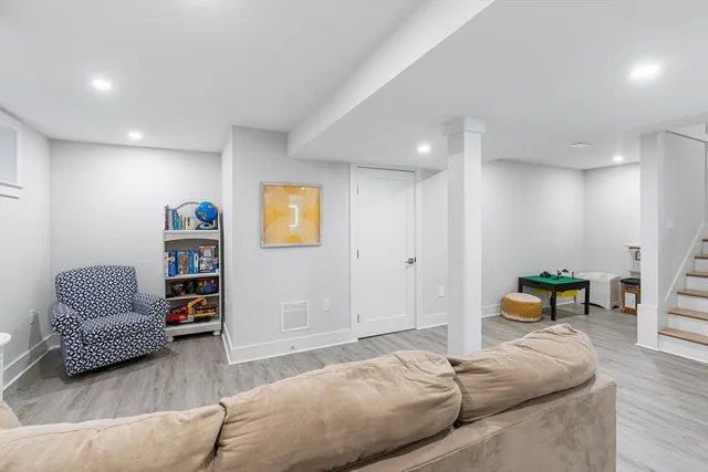 a bedroom with furniture and a couch