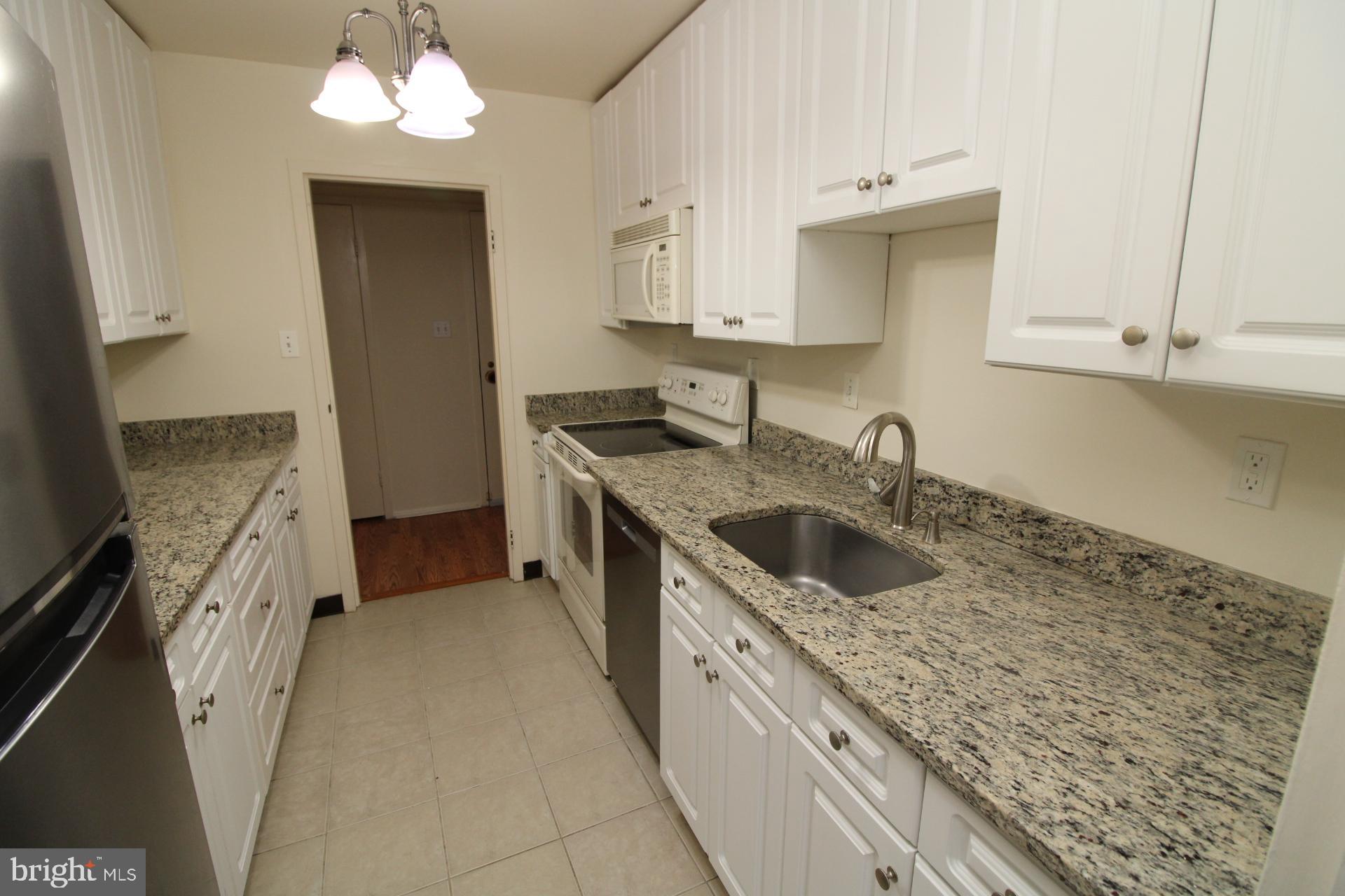 9701 Fields Road, Unit 407 Gaithersburg, MD 20878 - Photo 6 of 29 Remodeled Kitchen