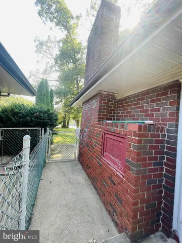 a view of a balcony with wooden floor