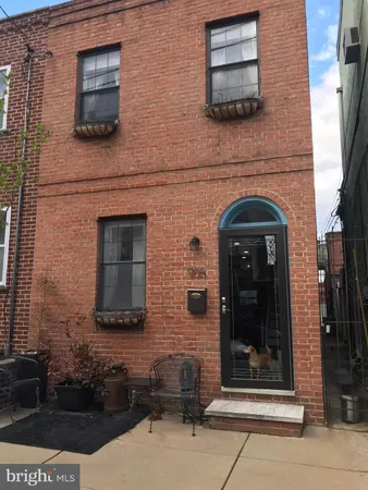 a front view of a house with a door