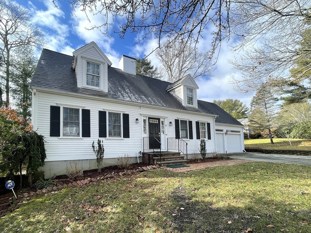 25 Wedgewood Drive Barnstable, MA 02632 - Photo 1 of 20 a front view of a house with a yard