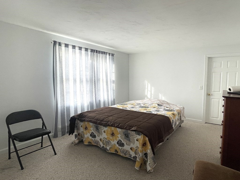 25 Wedgewood Drive Barnstable, MA 02632 - Photo 15 of 20 a bedroom with a bed chair and window