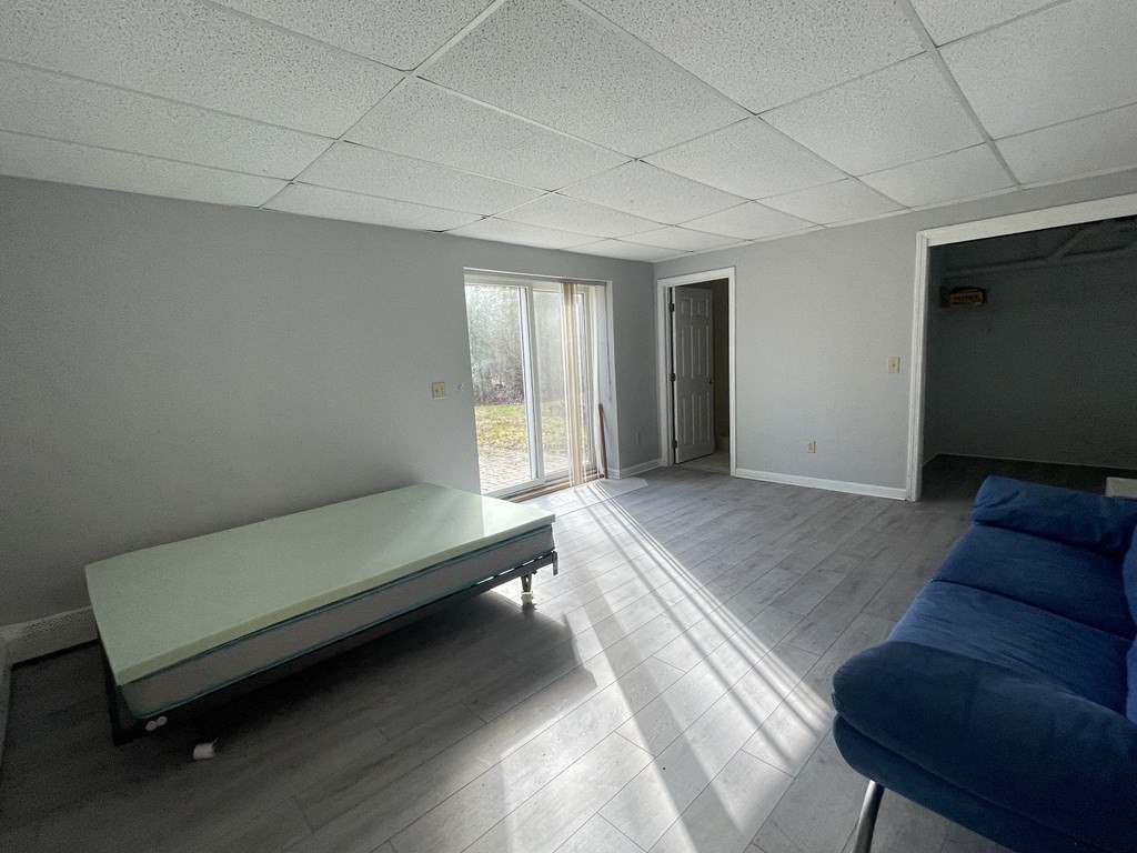 25 Wedgewood Drive Barnstable, MA 02632 - Photo 18 of 20 a bedroom with a bed and a couch