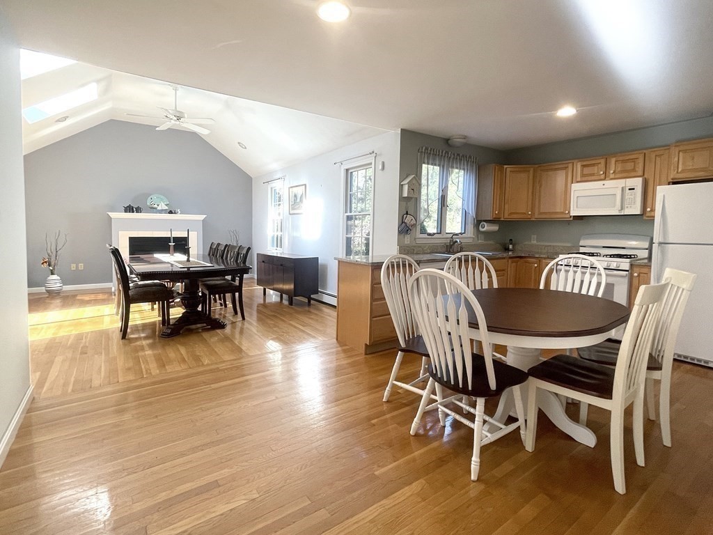 25 Wedgewood Drive Barnstable, MA 02632 - Photo 9 of 20 a view of a dining room with furniture window and wooden floor