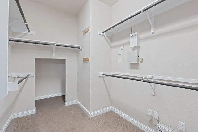 a view of a room with racks on the wall