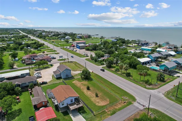 a view of a park that has a sign board