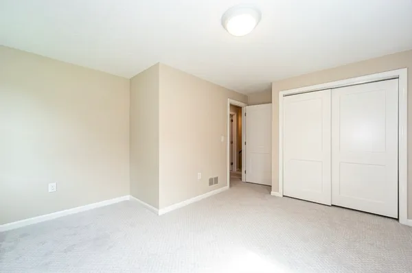a bathroom with a bathtub sink and window