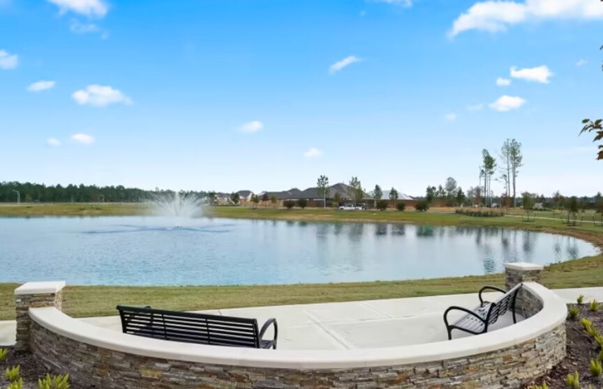 15166 Wild Gully Way Conroe, TX 77302 - Photo 19 of 21 a view of a swimming pool and lake view