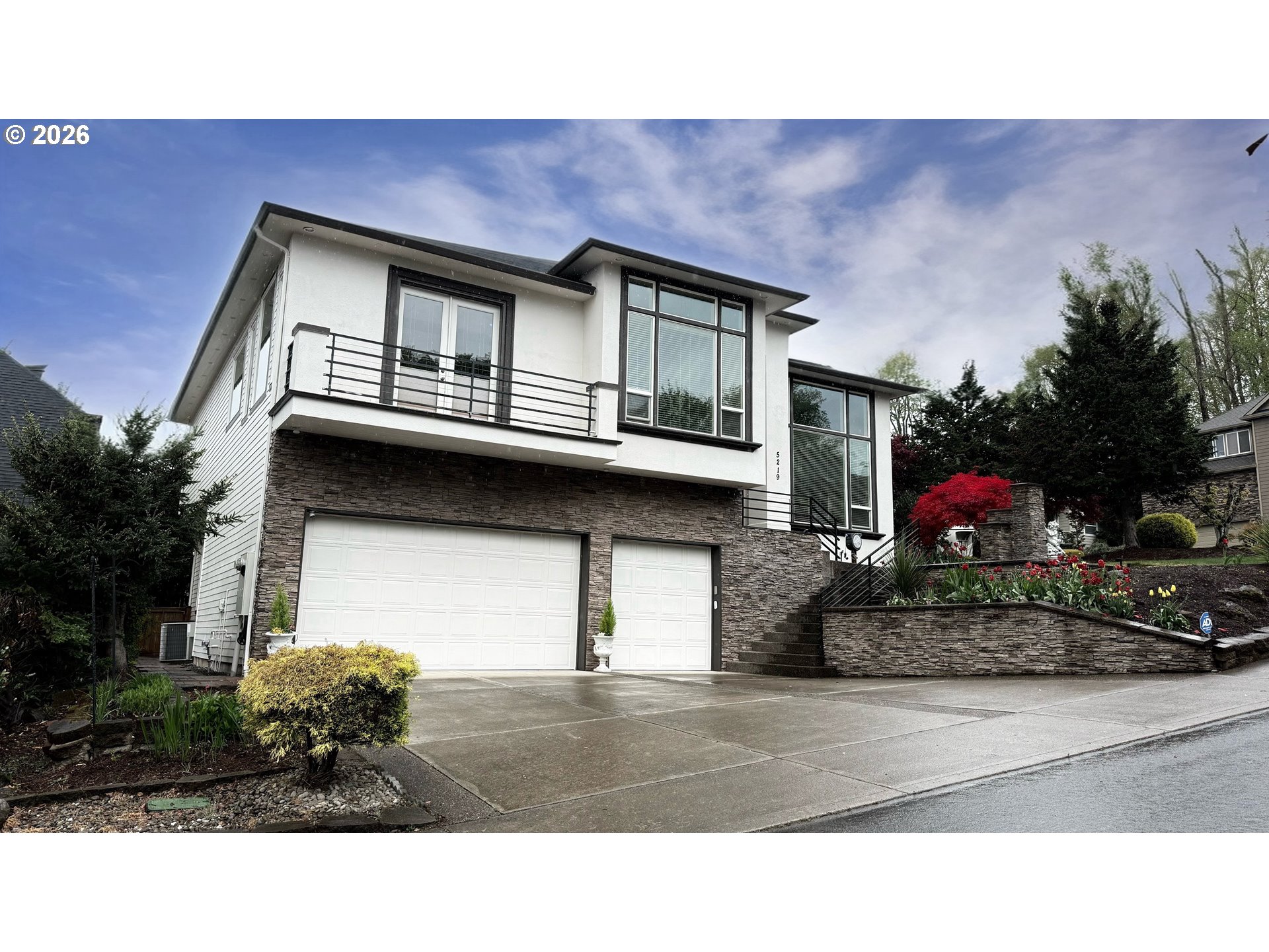 5219 Northwest Fernridge Drive Camas, WA 98607 - Photo 2 of 48 a black and white photo of a house