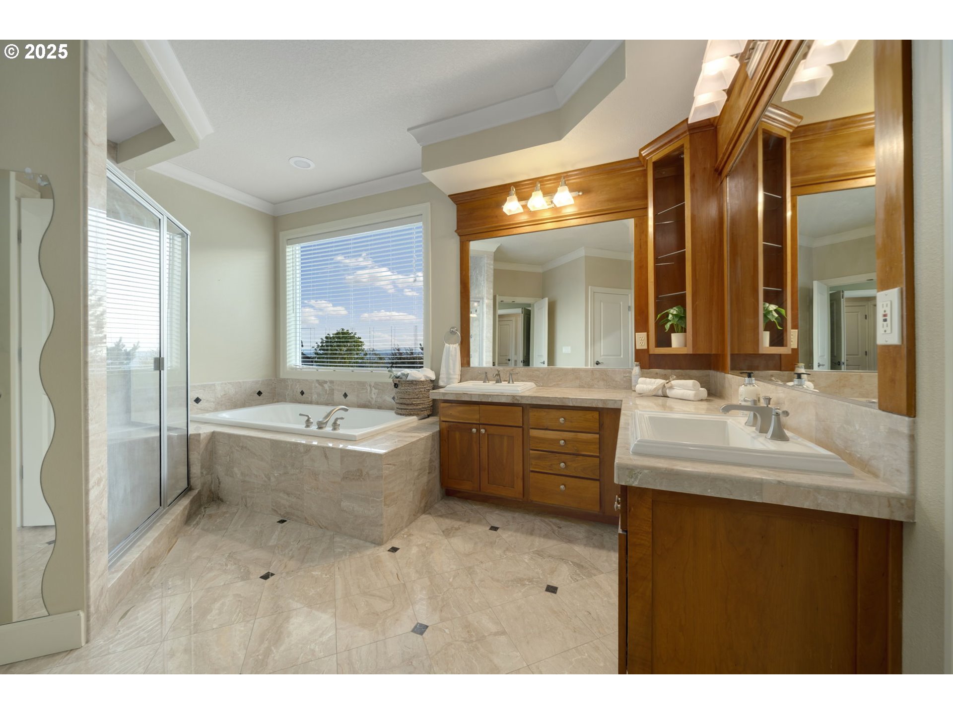 5219 Northwest Fernridge Drive Camas, WA 98607 - Photo 22 of 48 a bathroom with a tub sink toilet and mirror