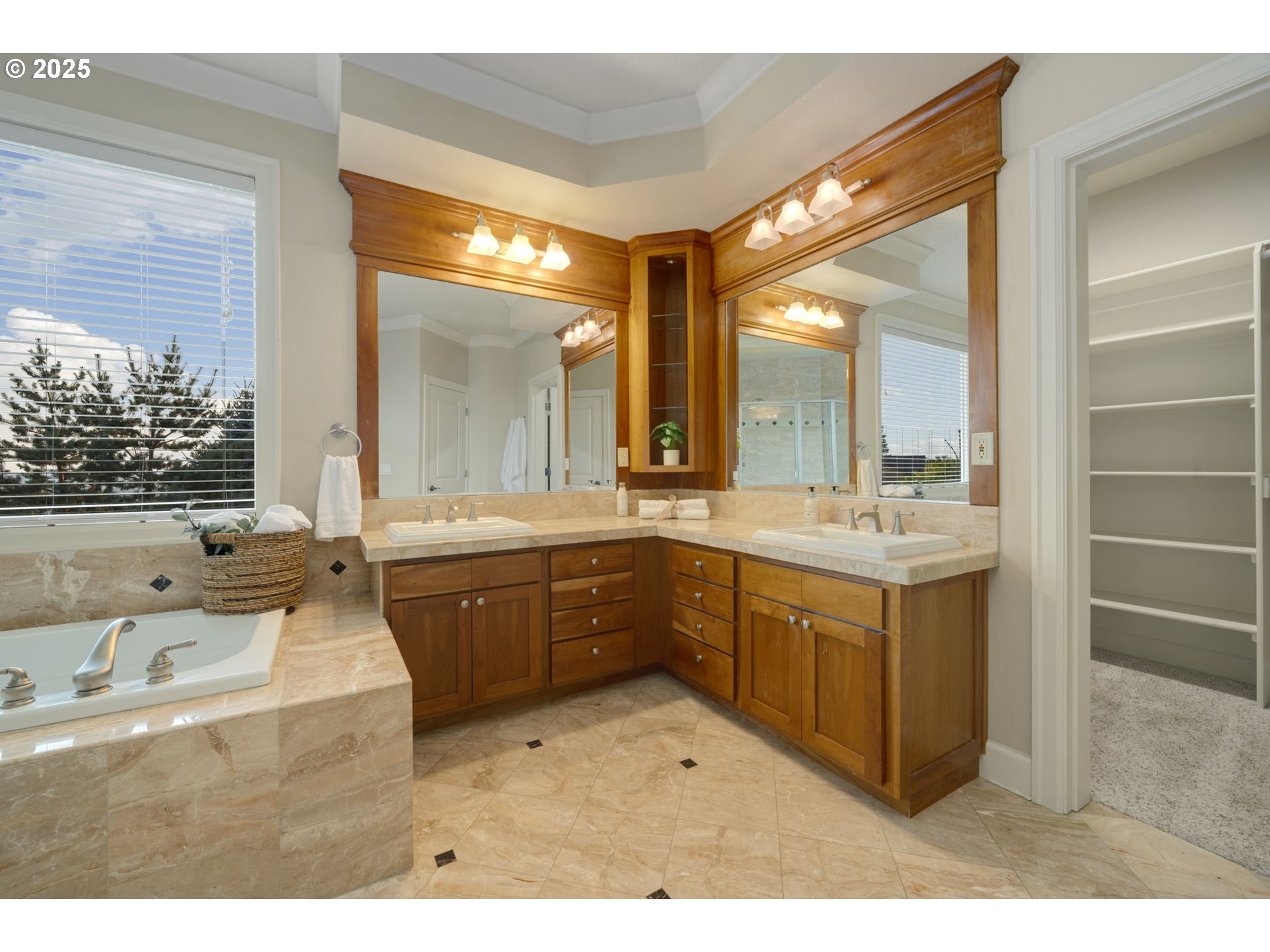 5219 Northwest Fernridge Drive Camas, WA 98607 - Photo 23 of 48 a bathroom with a sink mirror and a bath tub