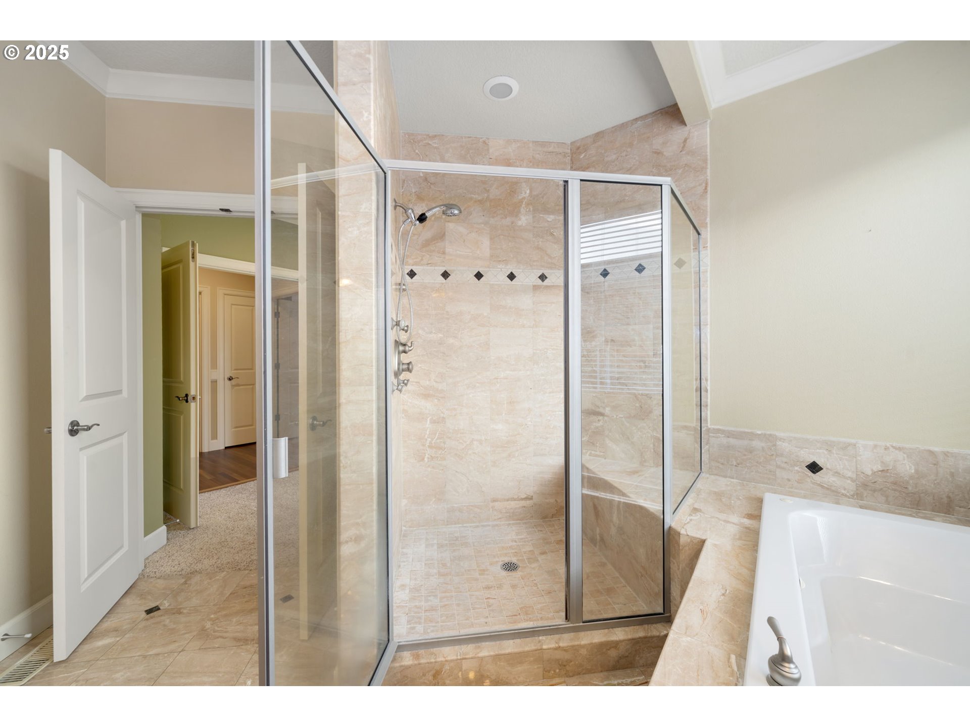 5219 Northwest Fernridge Drive Camas, WA 98607 - Photo 24 of 48 a bathroom with a glass shower door