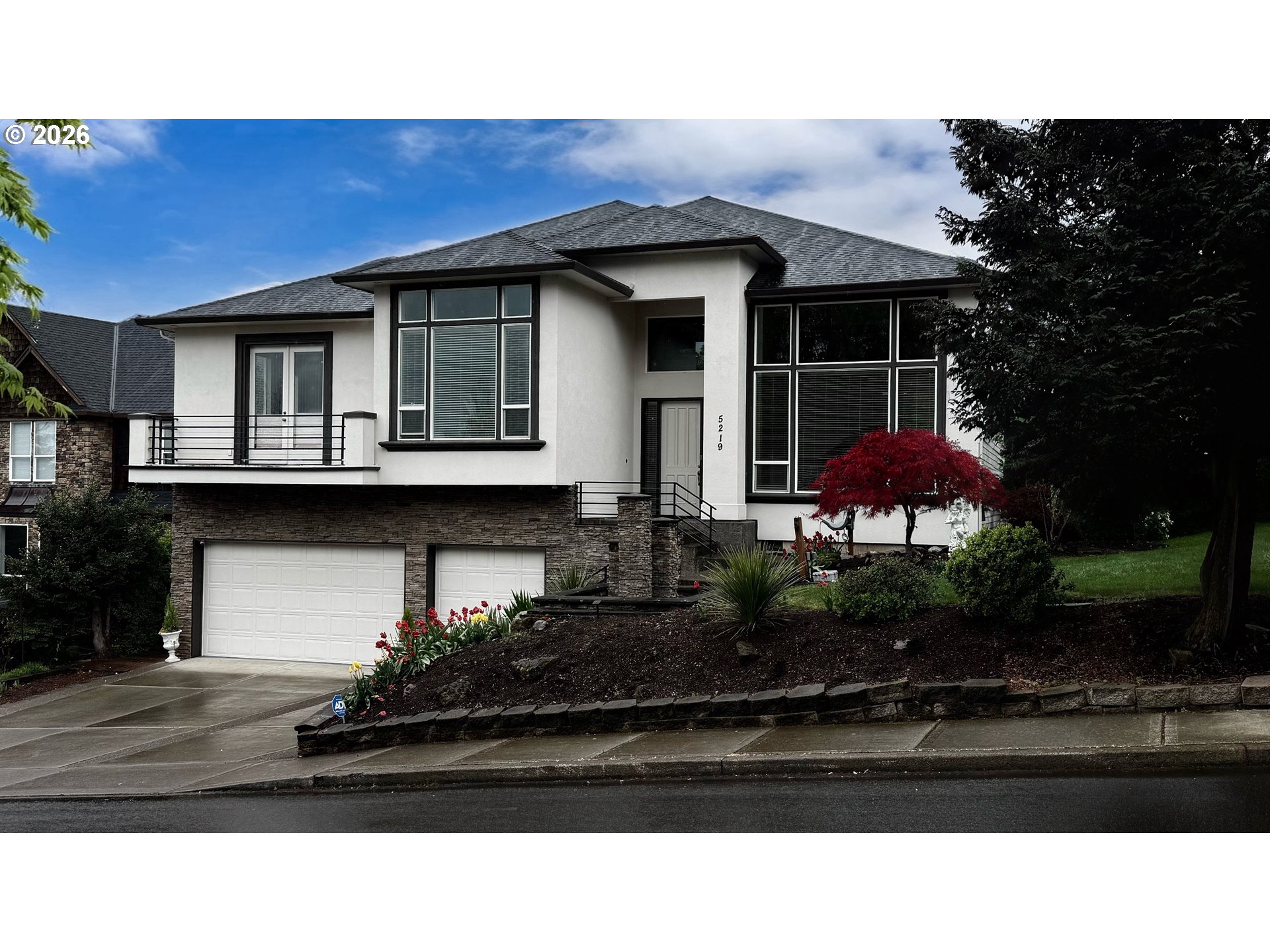 5219 Northwest Fernridge Drive Camas, WA 98607 - Photo 3 of 48 a front view of a house with a yard