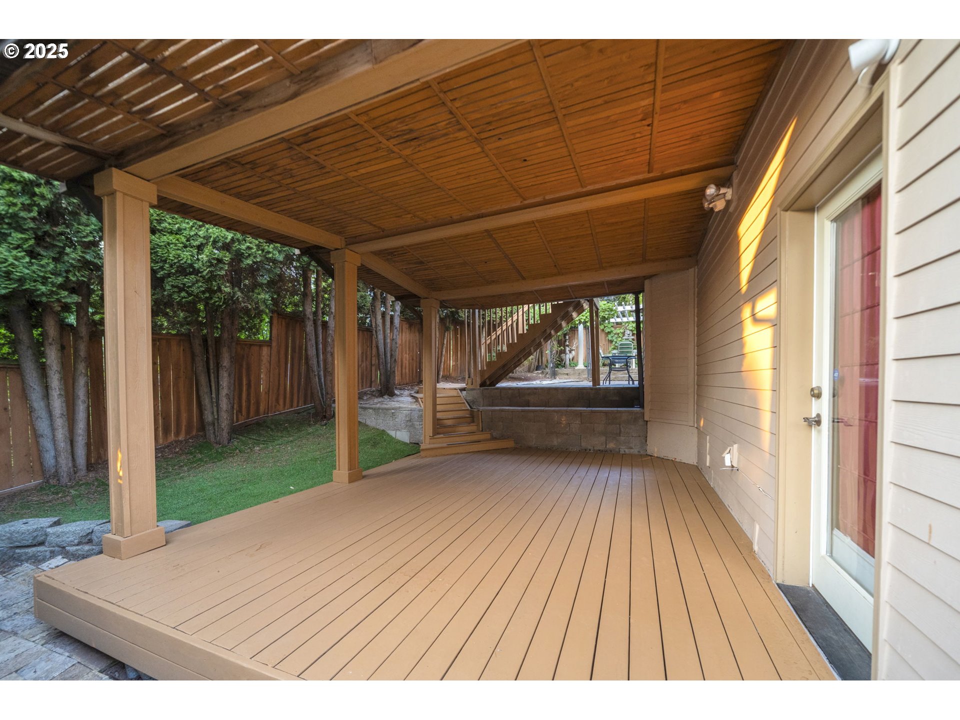 5219 Northwest Fernridge Drive Camas, WA 98607 - Photo 38 of 48 a view of backyard with large trees and wooden fence