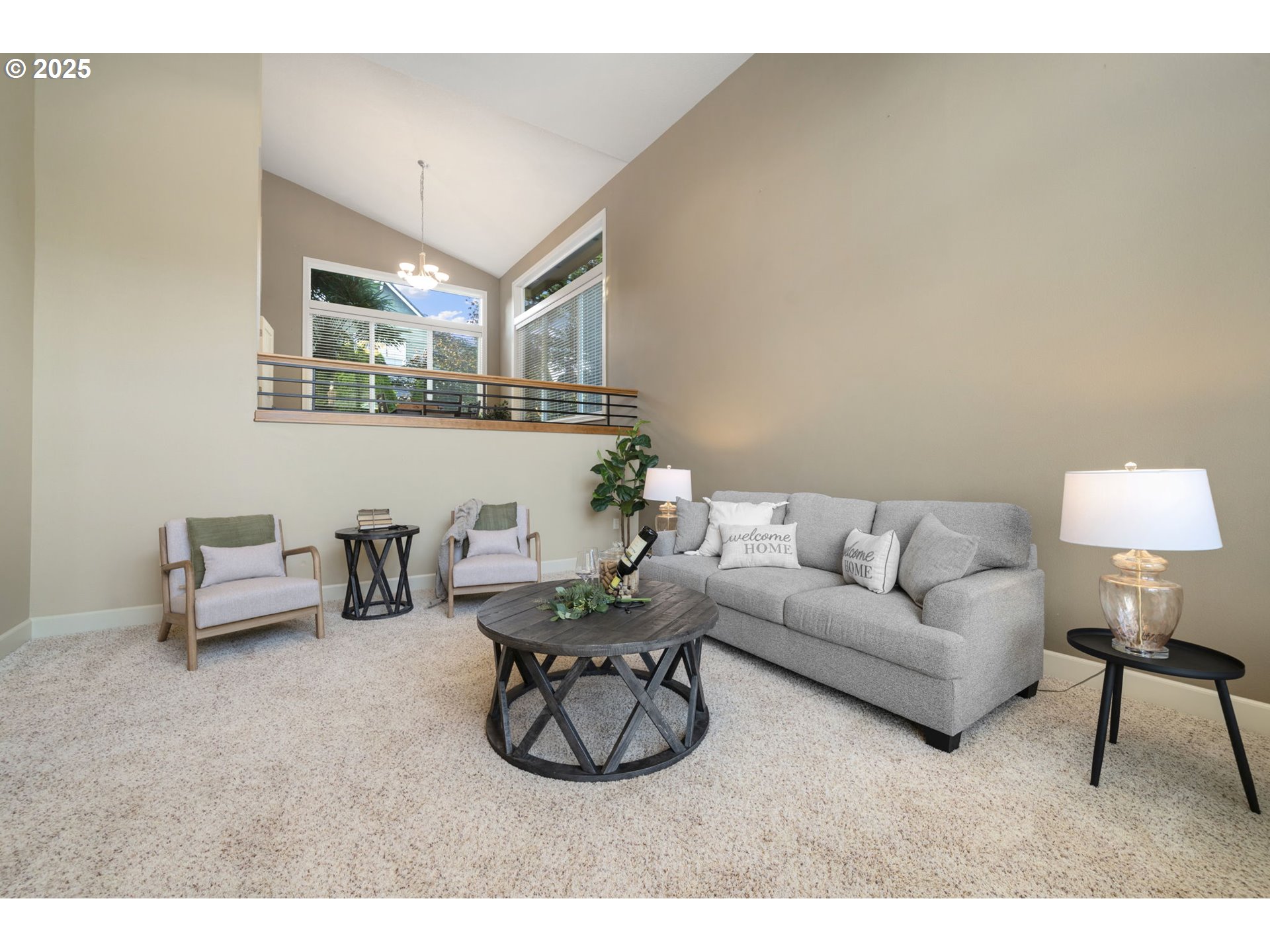 5219 Northwest Fernridge Drive Camas, WA 98607 - Photo 6 of 48 a living room with furniture a rug and a lamp