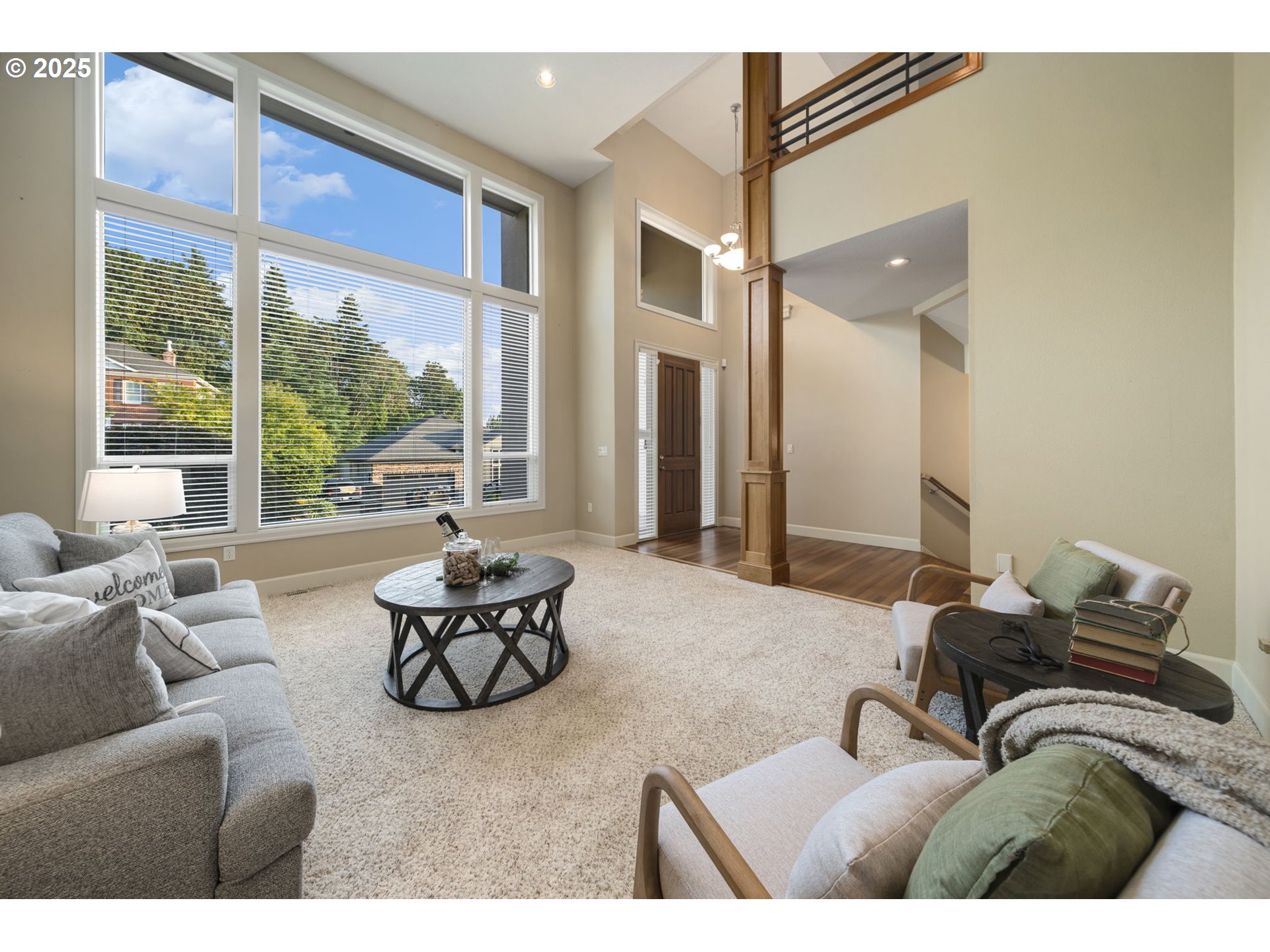 5219 Northwest Fernridge Drive Camas, WA 98607 - Photo 7 of 48 a living room with furniture and large windows