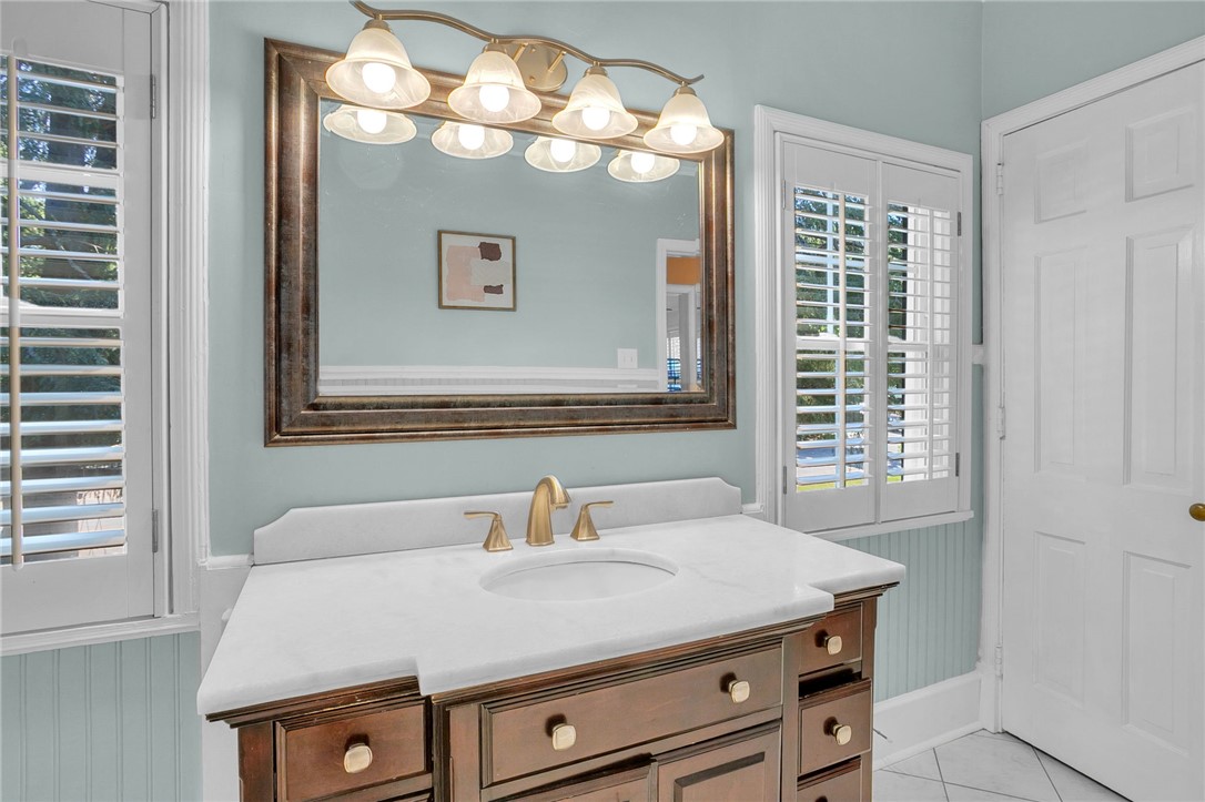 1107 Springdale Road Anderson, SC 29621 - Photo 25 of 49 This bright bathroom features a single vanity, offering both style and utility.