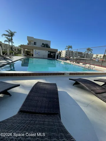 a view of balcony with furniture