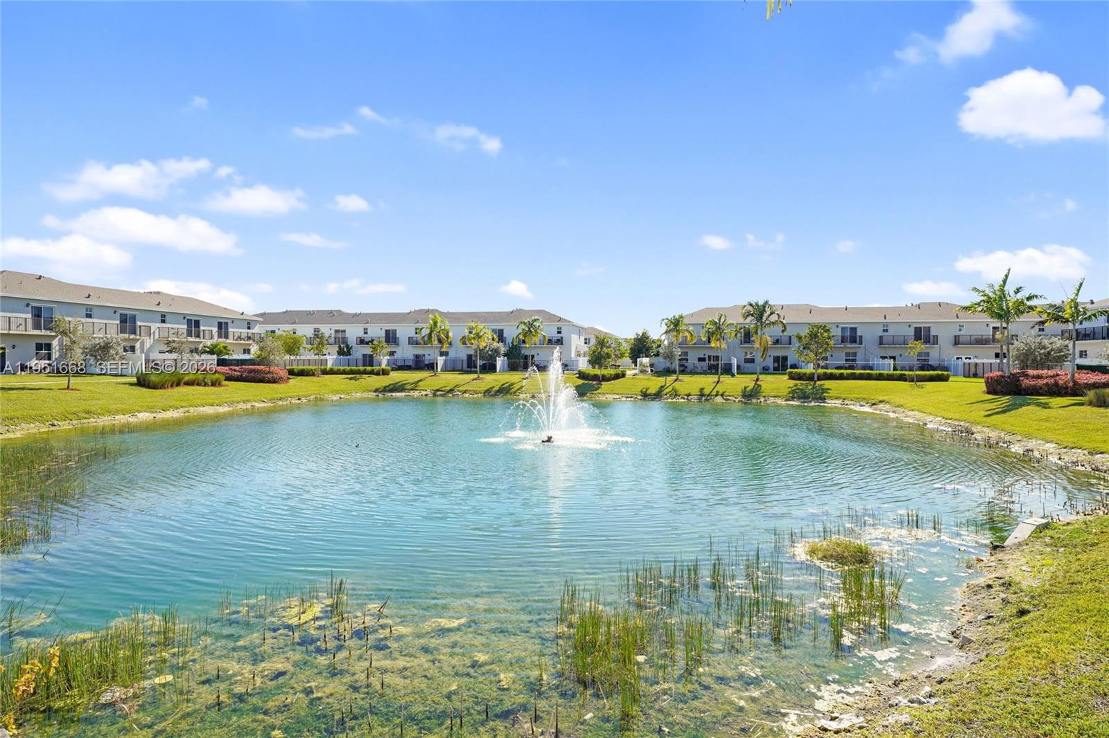 767 Southeast 18th Street Homestead, FL 33034 - Photo 29 of 29 a view of a lake with houses