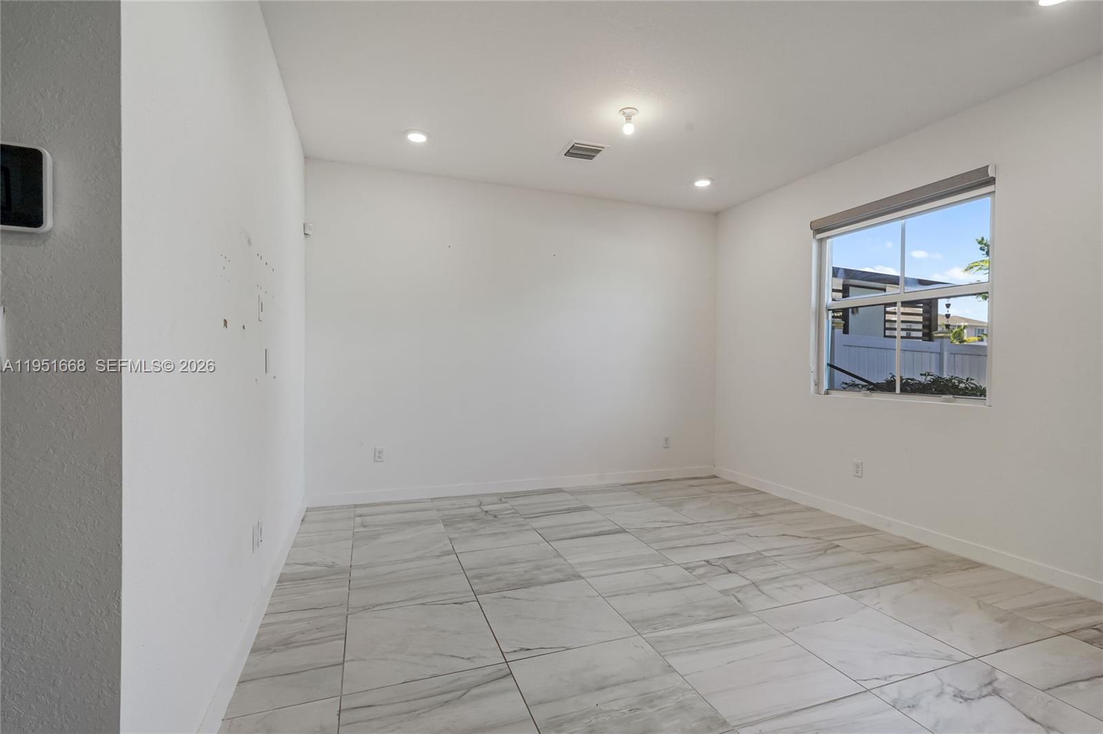 767 Southeast 18th Street Homestead, FL 33034 - Photo 9 of 29 a view of an empty room