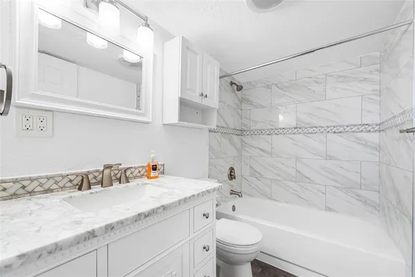 a view of a kitchen with utility and a sink