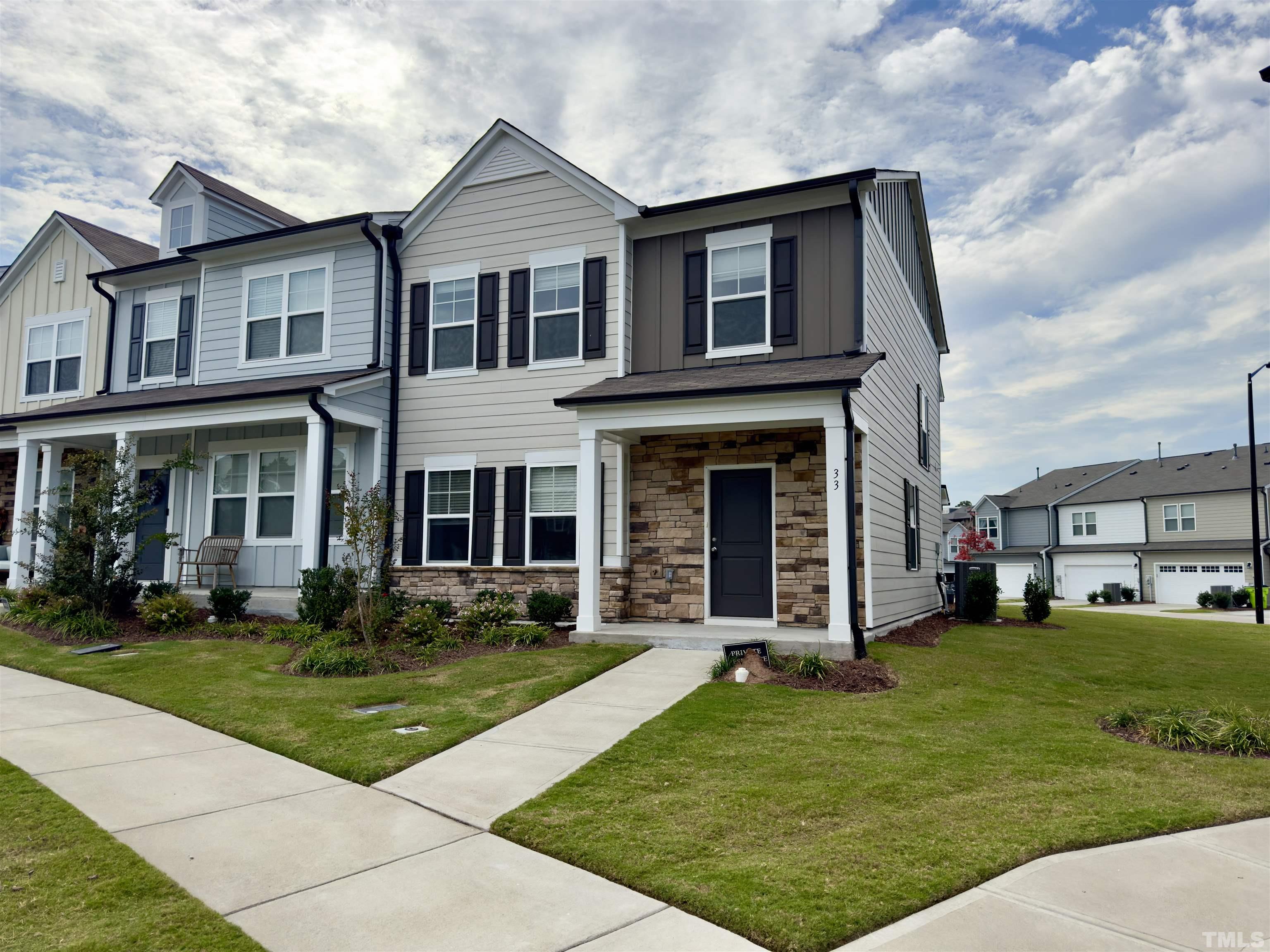 33 Rambler Lane Durham, NC 27703 - Photo 2 of 36 a front view of a house with a yard
