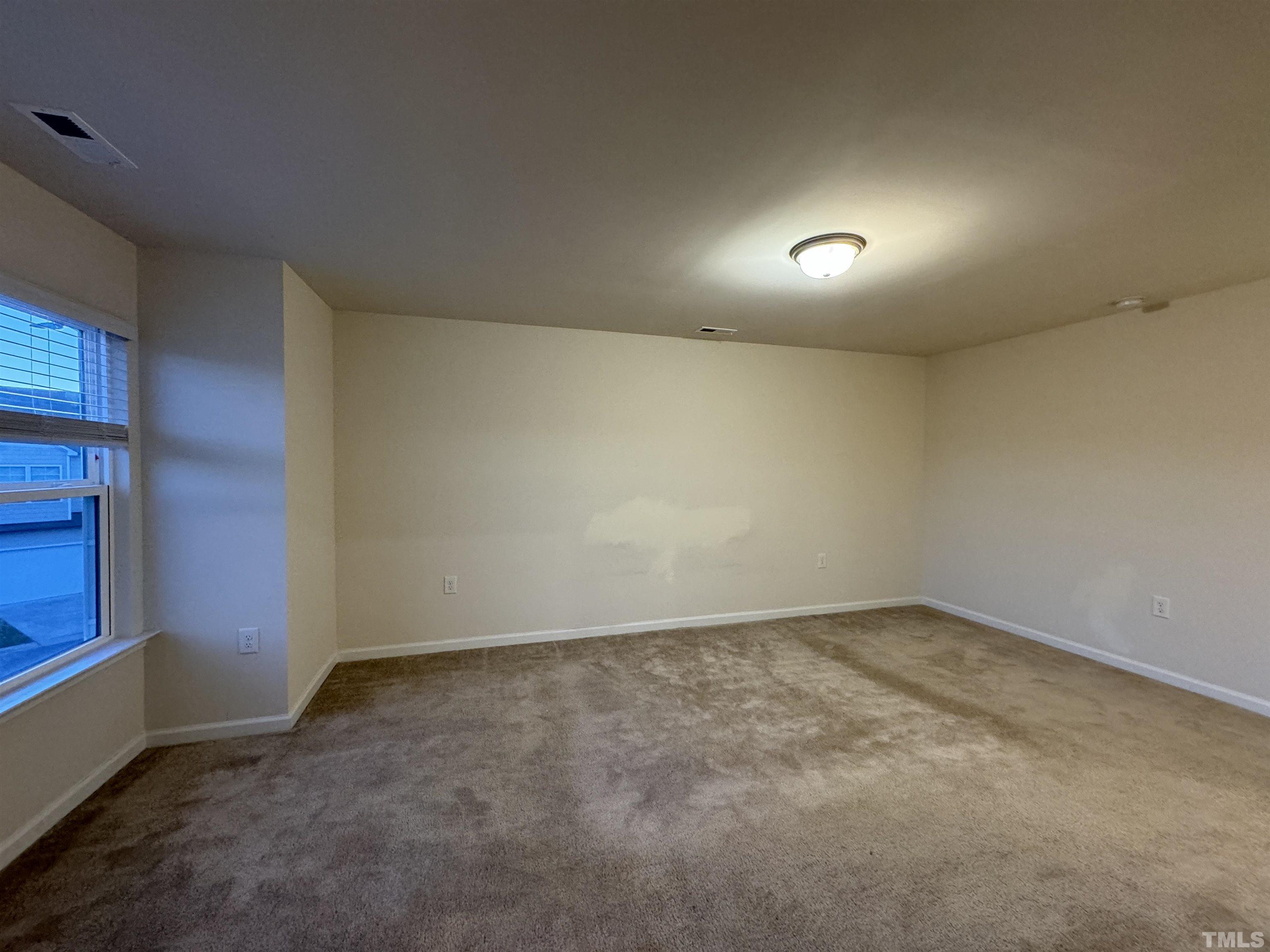33 Rambler Lane Durham, NC 27703 - Photo 22 of 36 an empty room with a window