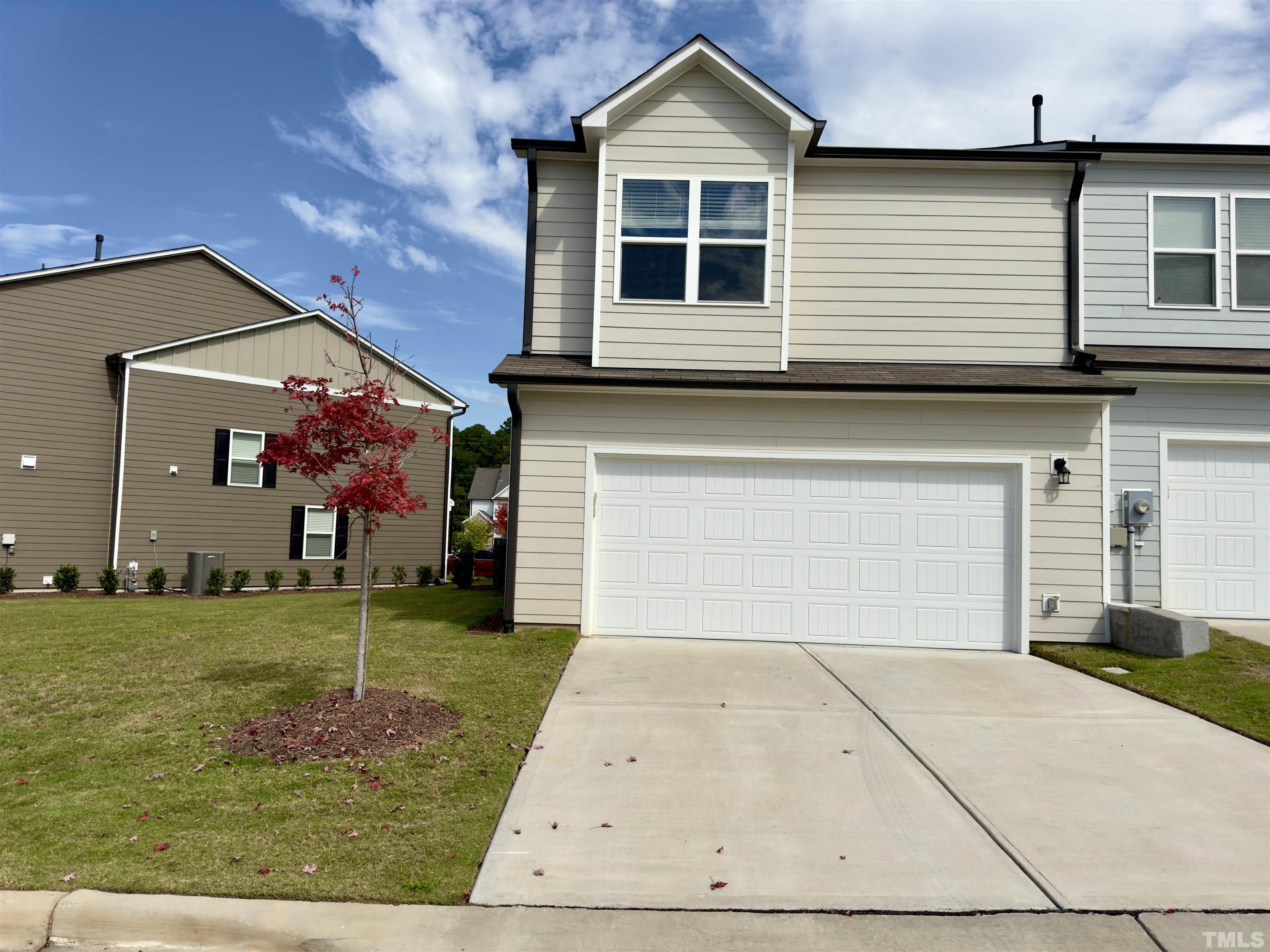 33 Rambler Lane Durham, NC 27703 - Photo 32 of 36 a front view of a house with garden