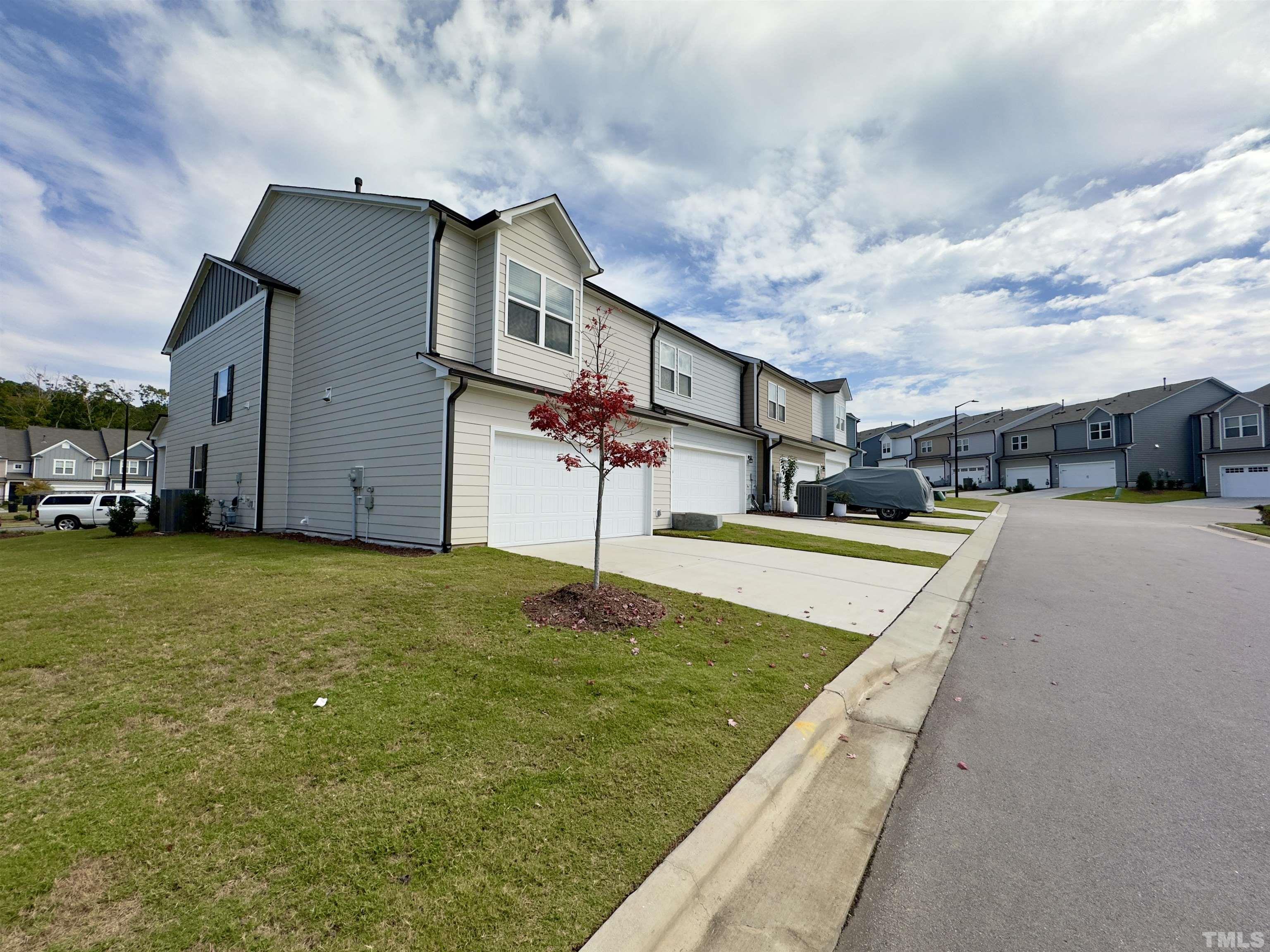 33 Rambler Lane Durham, NC 27703 - Photo 34 of 36 a view of a house with a yard