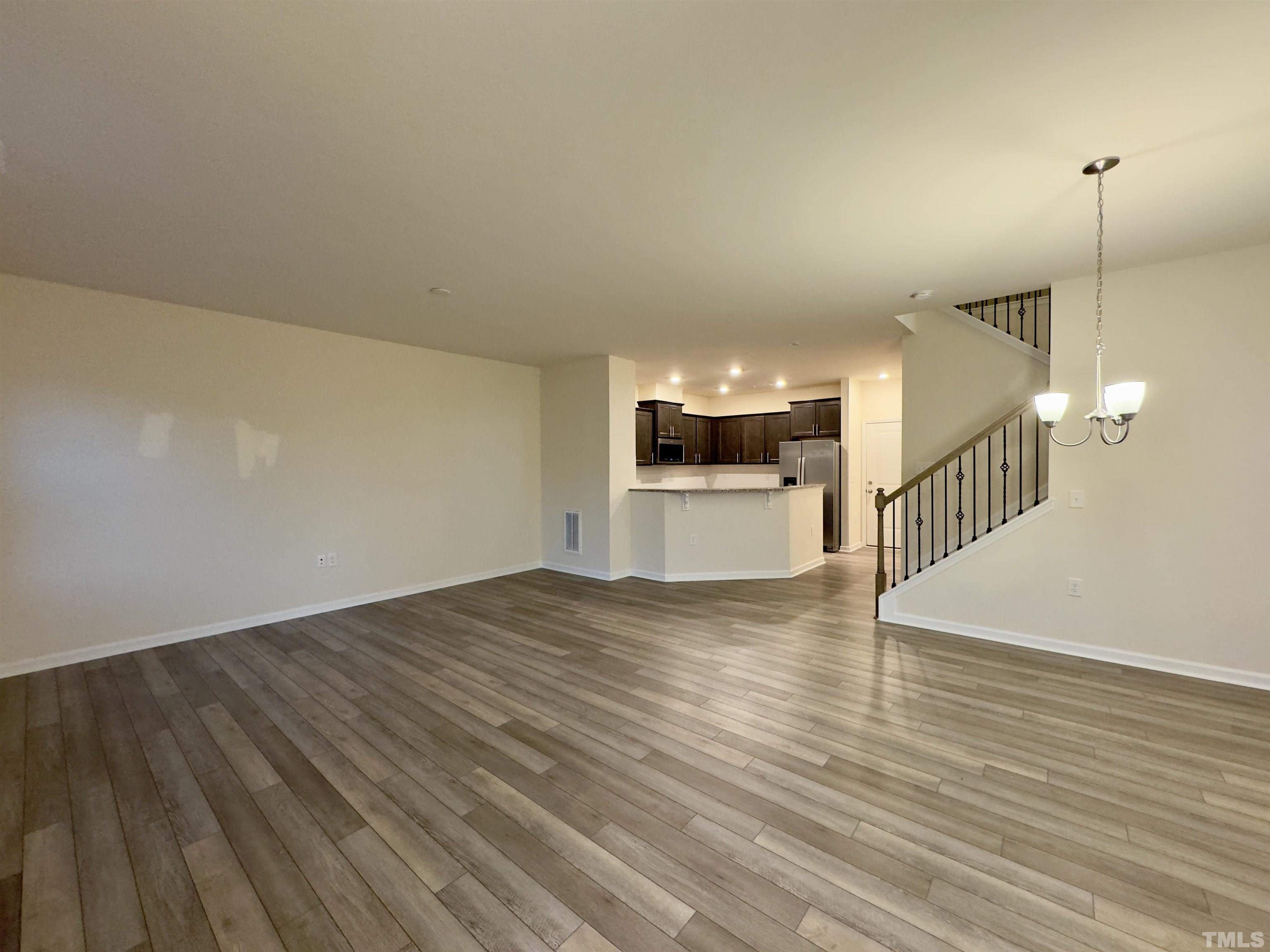 33 Rambler Lane Durham, NC 27703 - Photo 6 of 36 a view of a kitchen with wooden floor and a sink