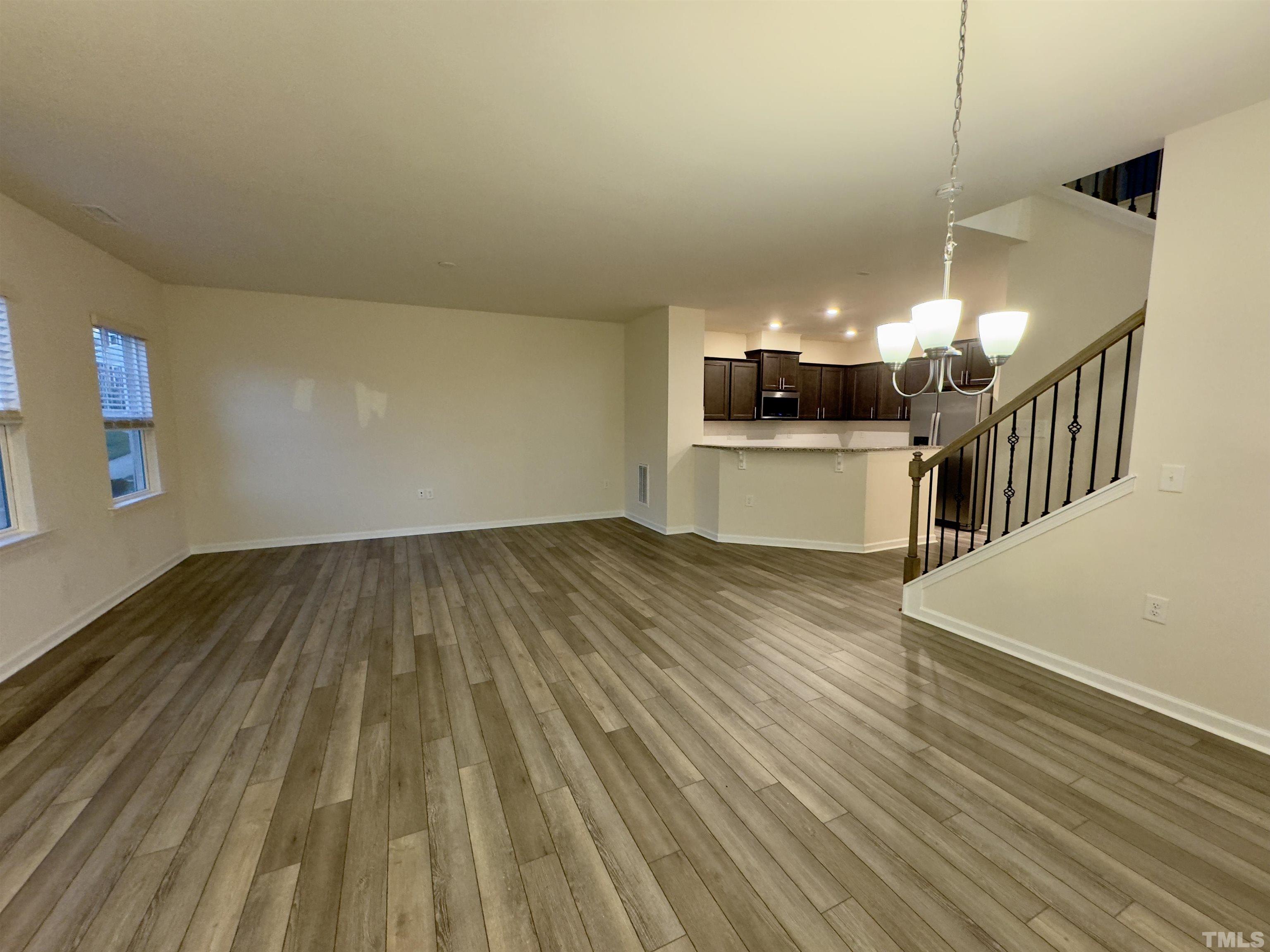 33 Rambler Lane Durham, NC 27703 - Photo 7 of 36 a view of a room with wooden floor