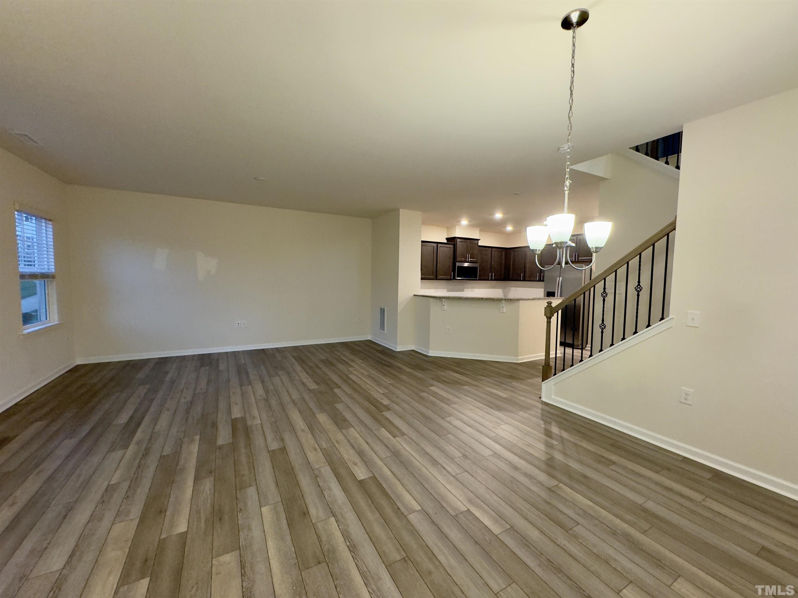 33 Rambler Lane Durham, NC 27703 - Photo 8 of 36 a view of a room with wooden floor