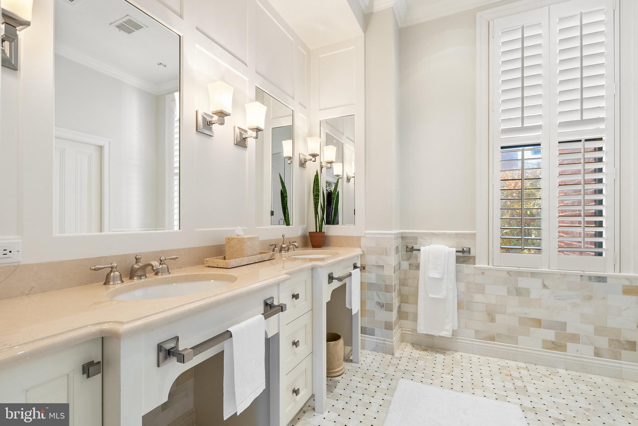 1601 28th Street Northwest Washington, DC 20007 - Photo 23 of 29 a bathroom with a granite countertop sink mirror and a
